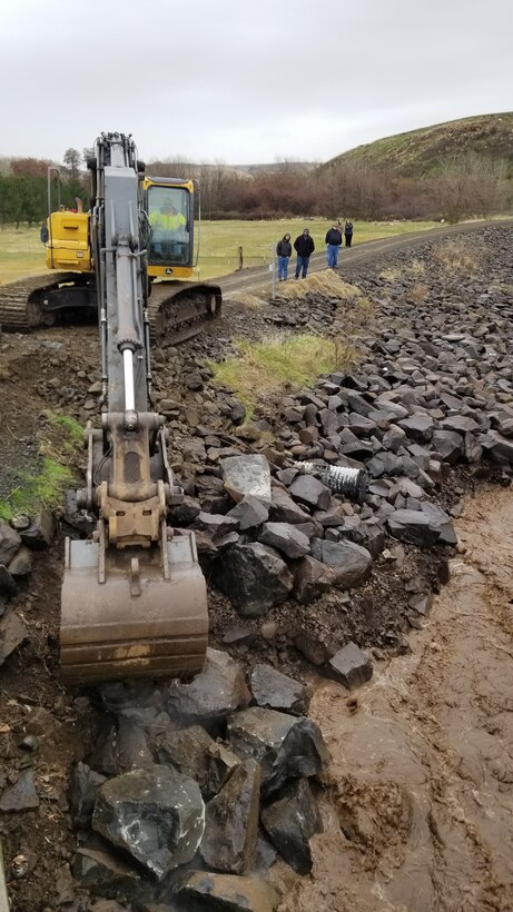 Levee repair work after the February 2020 flood event.