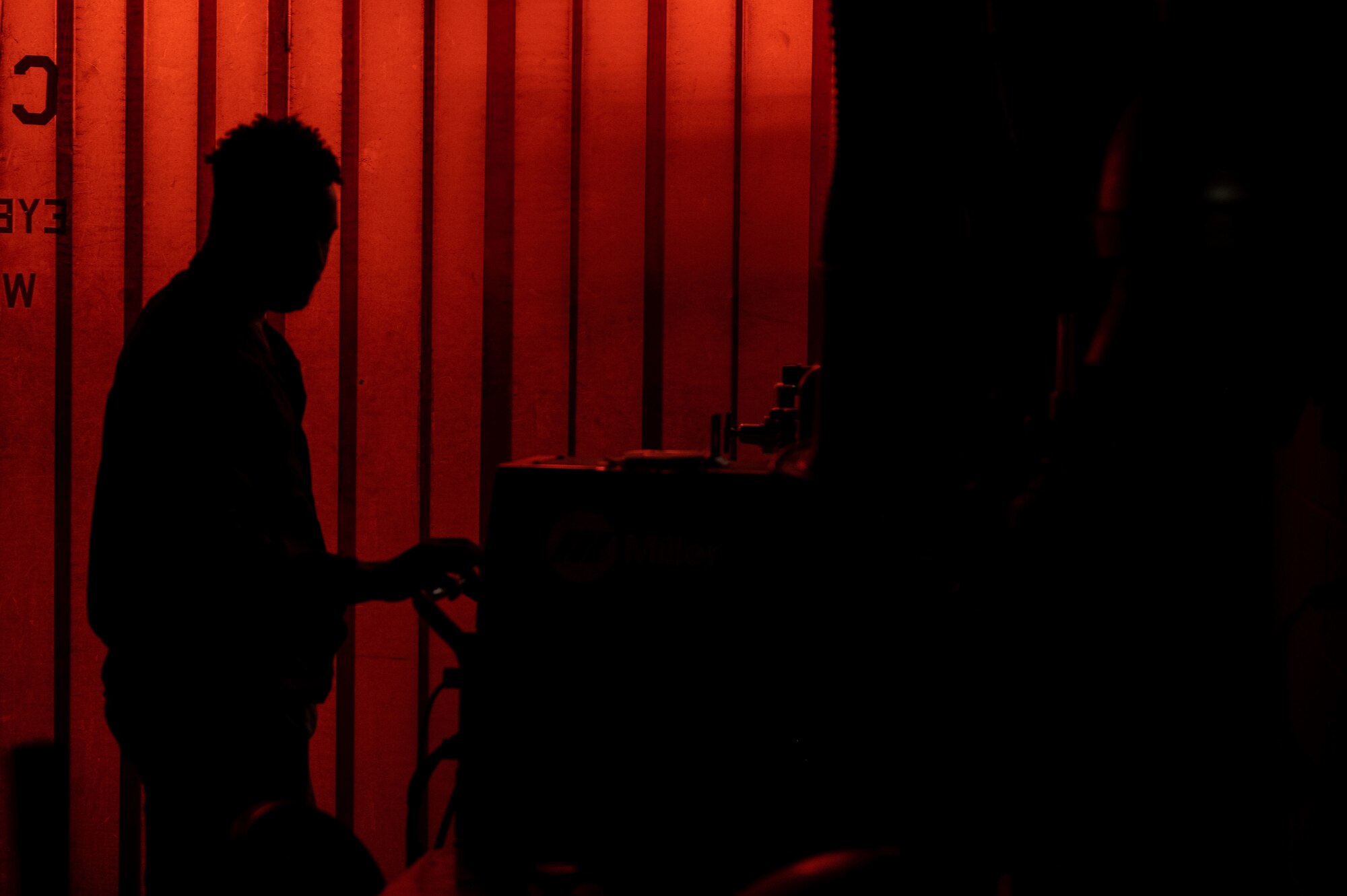 A metals tech prepares to weld.