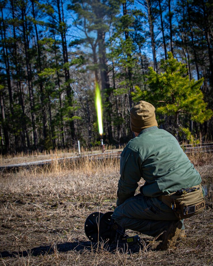 U.S. Marine Corps Staff Sgt. Benjamin McCabe, an Explosive Ordnance Disposal technician with Headquarters and Headquarters Squadron, prepare ordinance materials for disposal at Marine Corps Air Station Cherry Point, North Carolina, Jan. 18, 2022. Training events are intended to familiarize Marines with explosives and how to execute procedures safely.