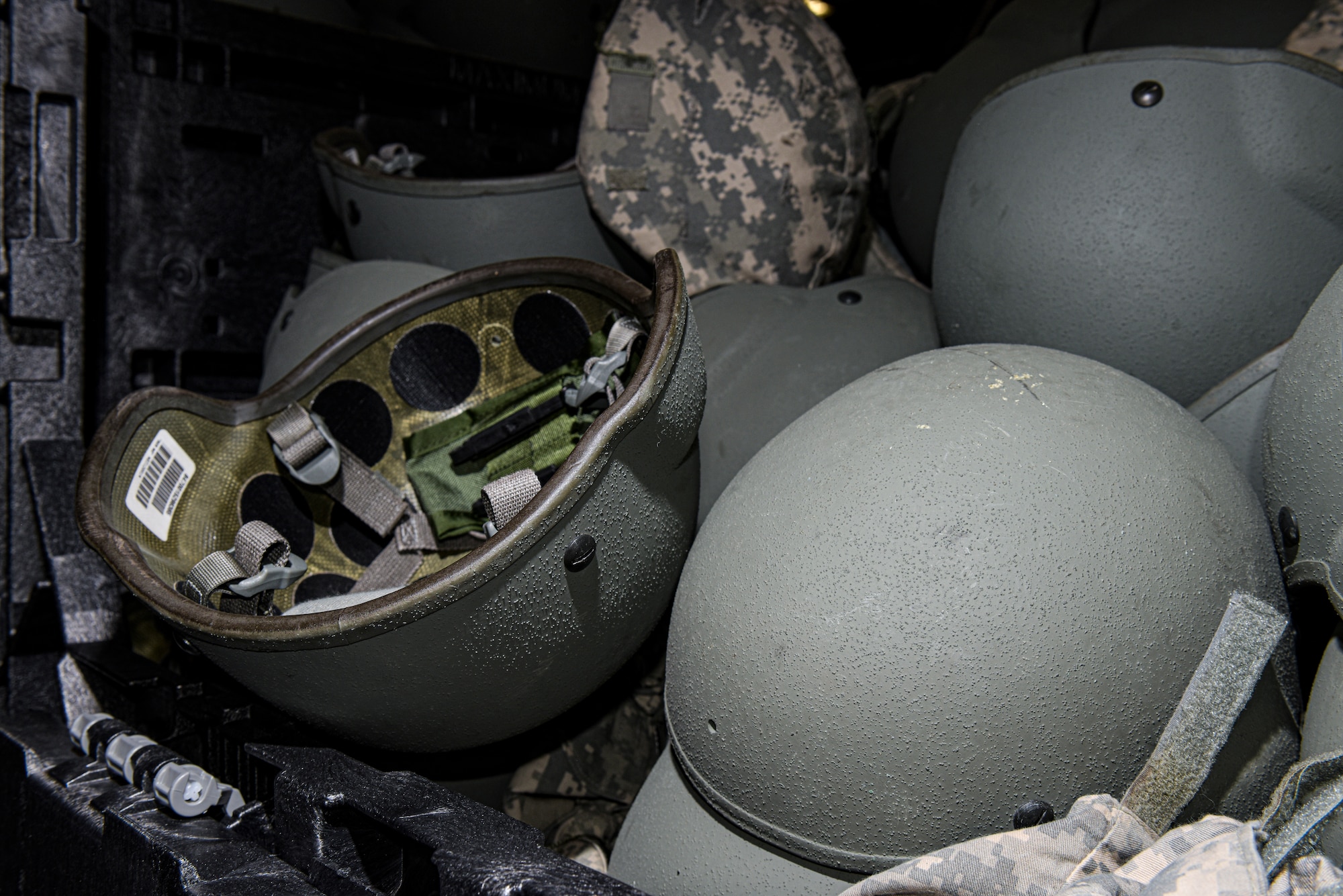 The 6th Logistics Readiness Squadron at MacDill Air Force Base, Florida issues out helmets as part of a deployment or training kit, Jan. 18, 2022.