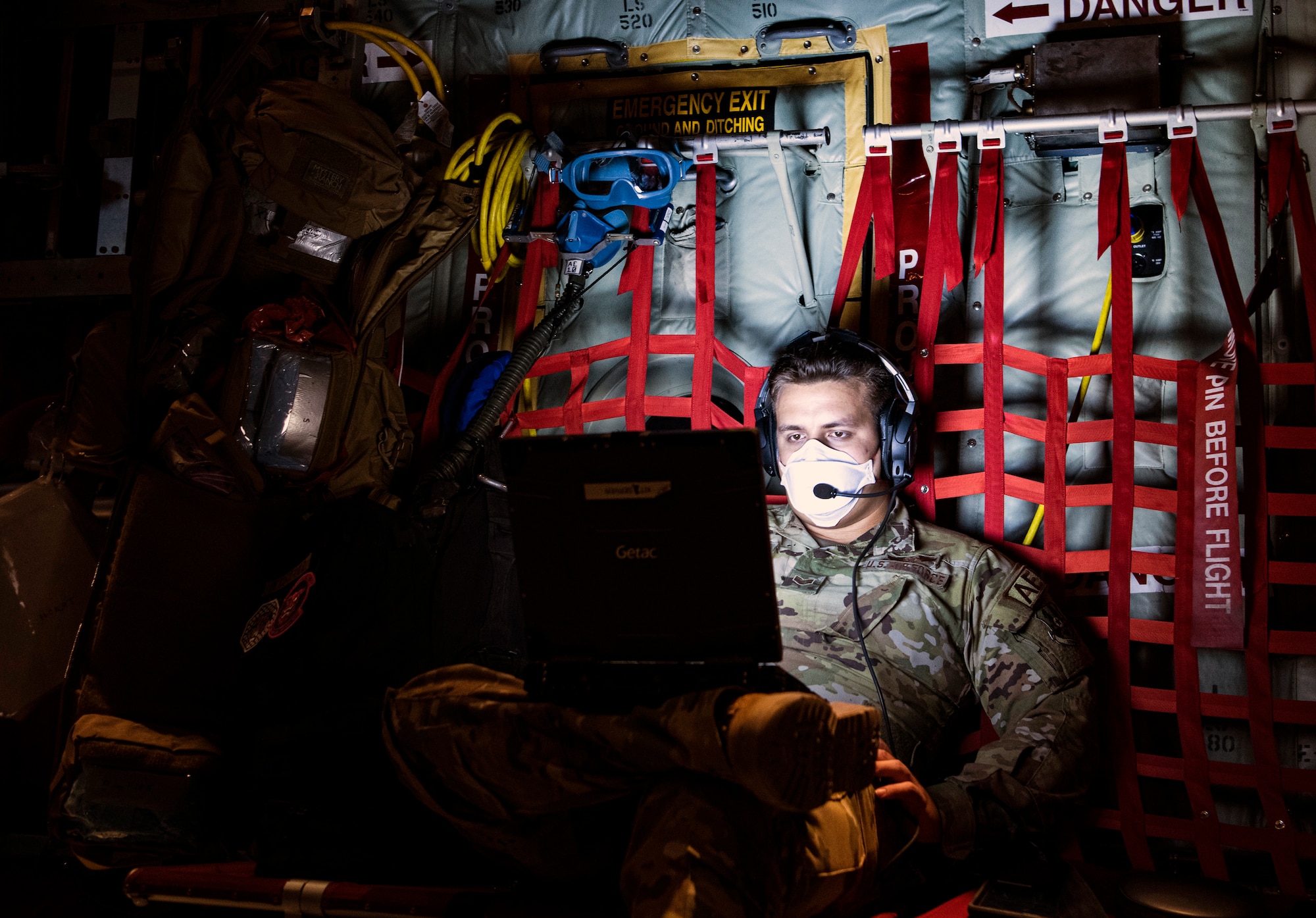 Staff Sgt. Diego Rodriguez, 379th Expeditionary Aeromedical Evacuation Squadron aeromedical technician, inputs data on a laptop