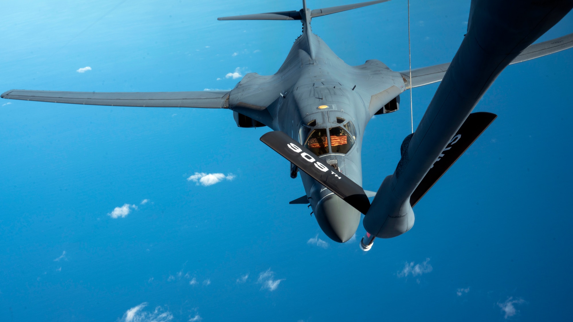 A B-1 Lancer from the 7th Bomber Wing prepares to receive fuel from a KC-135R Stratotanker over the Pacific Ocean
