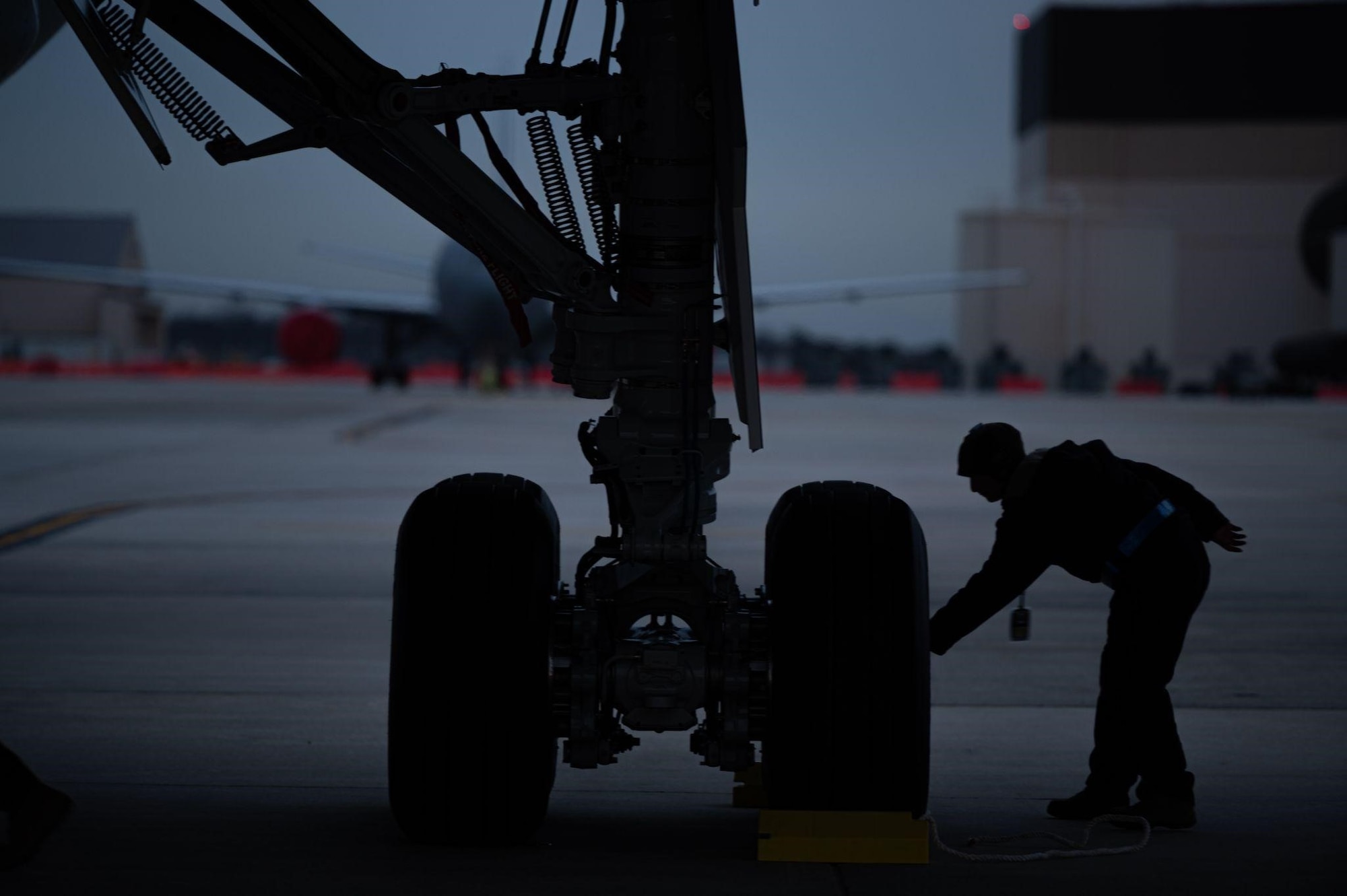Airman inspects KC-46 wheel