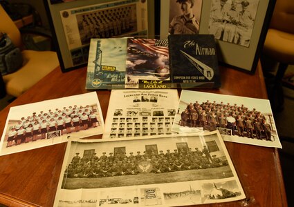 A sampling of Basic Military Training flight photos and books from various eras on display at the 37th Training Wing History Office