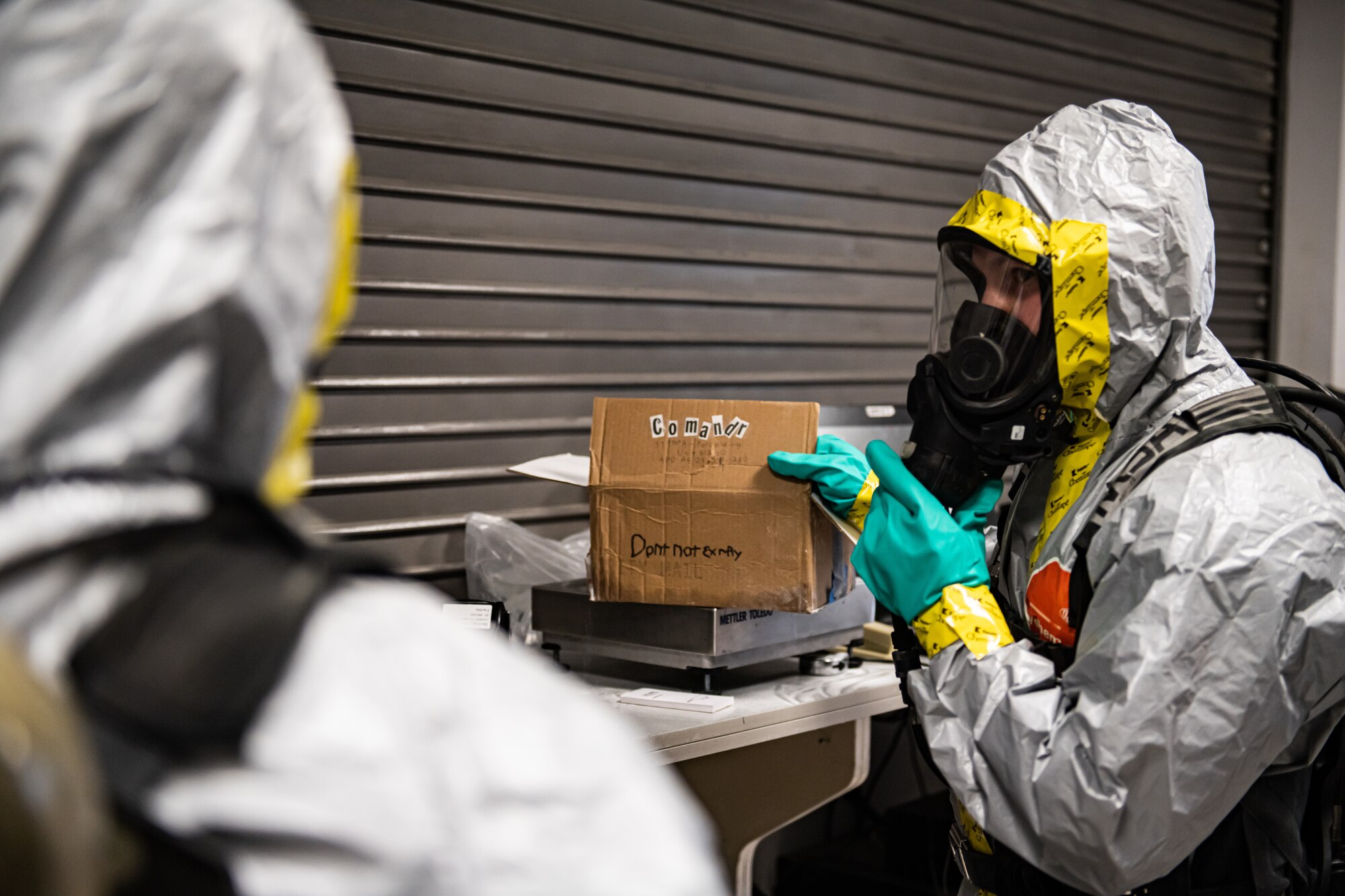 Airmen examine suspicious package.