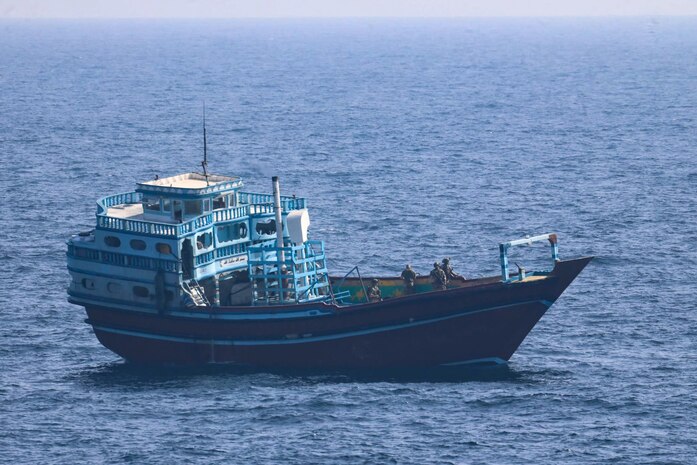 GULF OF OMAN (Jan. 18, 2022) U.S. service members conduct a boarding on a stateless fishing vessel transiting international waters the Gulf of Oman, Jan. 18. (U.S. Navy photo)