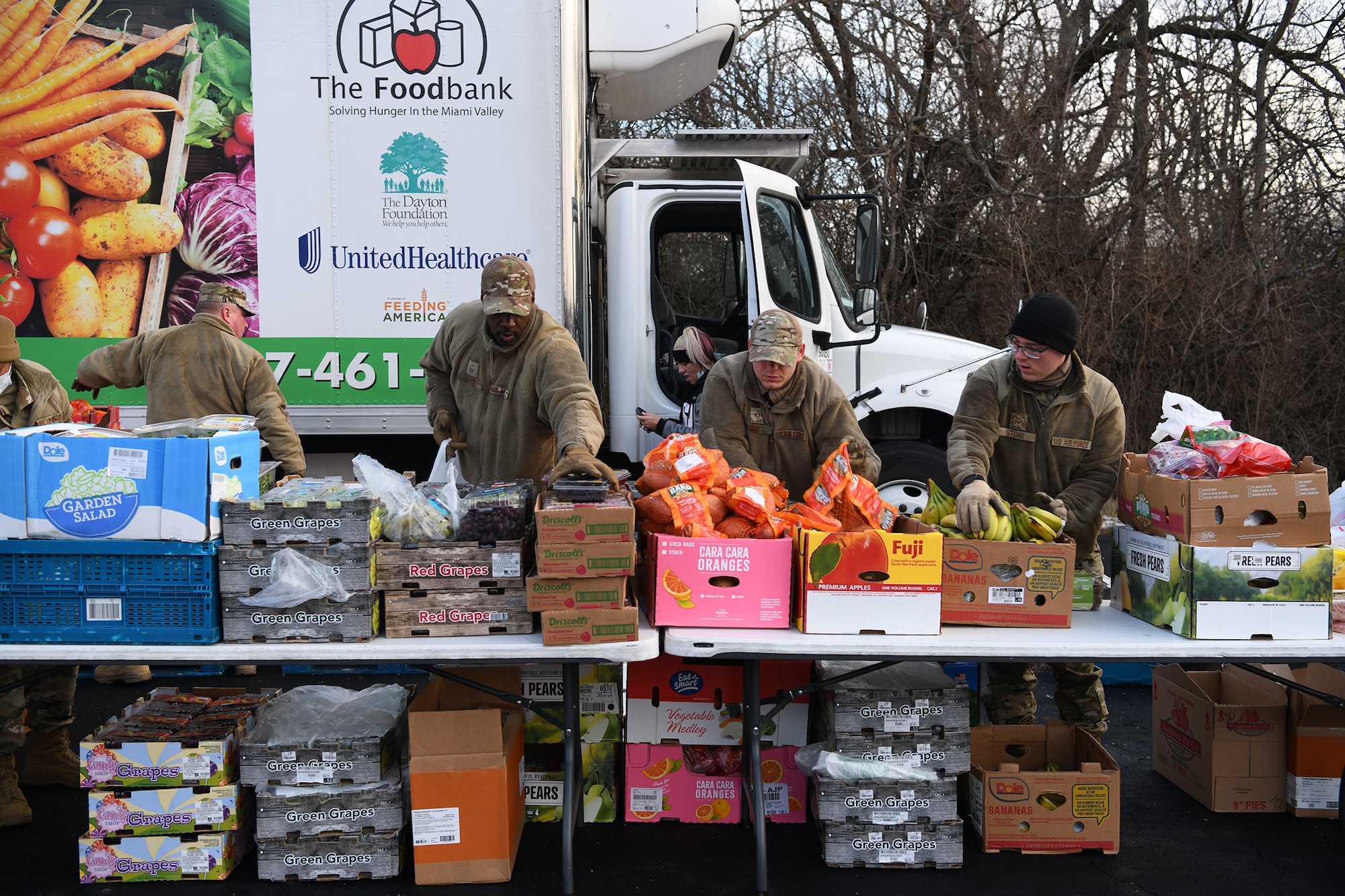 Fifteen Reserve Citizen Airmen from the 445th Airlift Wing and 655th Intelligence, Surveillance and Reconnaissance Wing, Wright-Patterson Air Force Base, Ohio, volunteered at a mobile food bank delivery held at Phillips Temple Church, Trotwood, Ohio Jan. 19, 2022. Volunteers collected, sorted, organized and prepped food that included fresh fruit, vegetables, chicken and baked goods that was given to families in need within the Trotwood area. The Airmen helped serve 86 families for a total of 145 individuals.