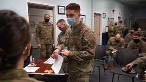 Air National Guardsmen from the 142nd Wing prepare to mobilize in support of Portland hospitals amid a surge in COVID-19 hospitalizations across Oregon, Jan. 14, 2022, Portland Air National Guard Base, Ore. The 142nd Wing  mobilized roughly 200 service members for this mission.