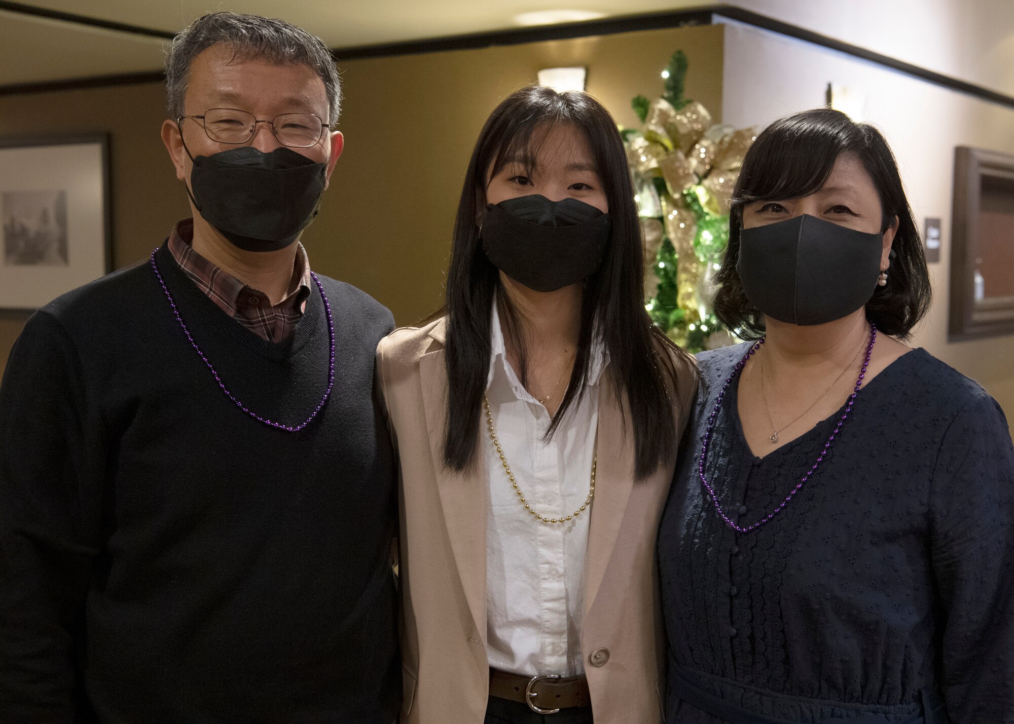 The Lee family poses for a photo