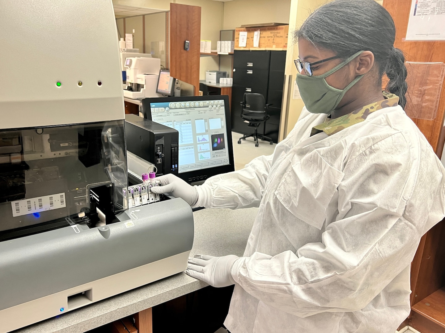 Sgt. Kandice Banks, medical laboratory specialist, 32nd Hospital Center conduct hematology tests during the medical skills readiness rotation hosted by Bayne-Jones Army Community Hospital.