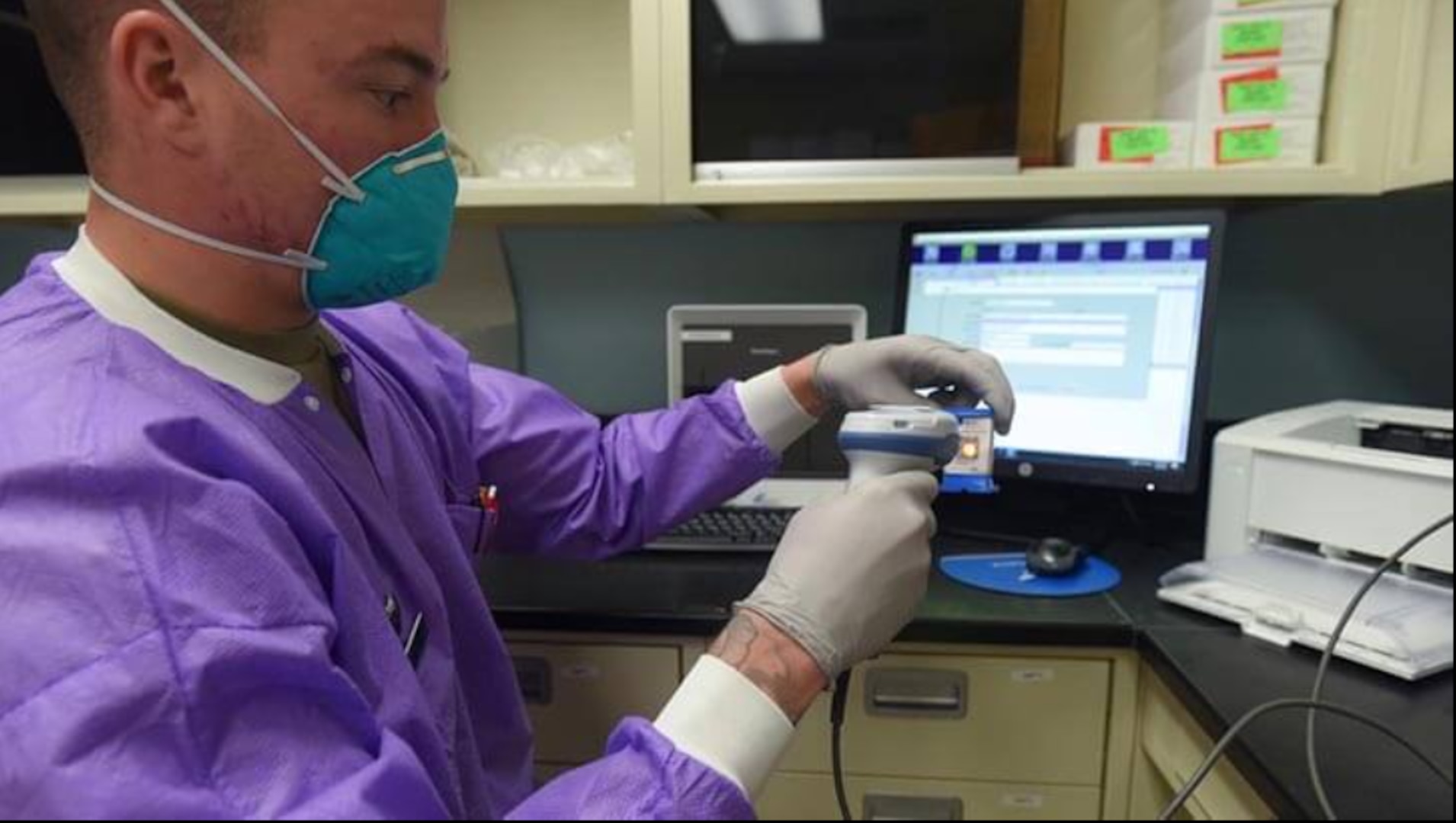 Air Force Staff Sgt. Cody Emery, 30th Medical Group medical lab technician, prepares a COVID-19 test sample for processing April 8, 2021, at Vandenberg Air Force Base, California (Photo by: Michael Peterson, Space Launch Delta 30 ).