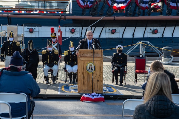 Secretary of the Navy Carlos Del Toro speaks at USS Constitution’s change of command ceremony aboard the ship.