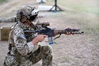 A Ranger from 3rd Battalion, 75th Ranger Regiment executes a live fire exercise with the IVAS Capability Set 4 during tropical weather testing in Camp Santiago, Puerto Rico, in March 2021.