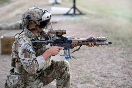 A Ranger from 3rd Battalion, 75th Ranger Regiment executes a live fire exercise with the IVAS Capability Set 4 during tropical weather testing in Camp Santiago, Puerto Rico, in March 2021.