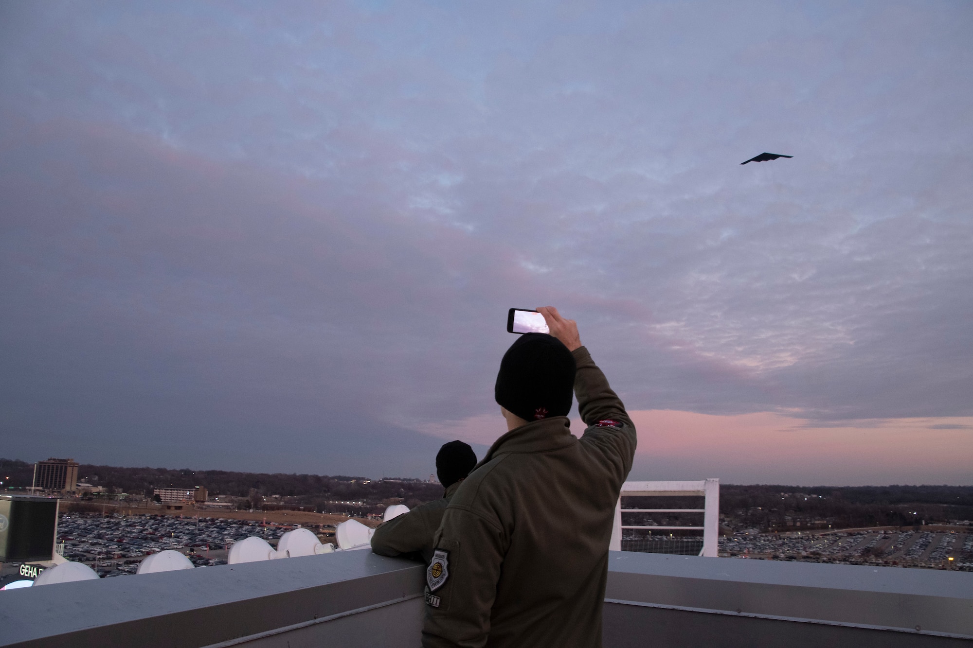 B-2 Spirit pilots from Whiteman Air Force Base observe a flyover before the AFC Divisional Playoff game at Arrowhead Stadium, Kansas City, Missouri, Jan. 23, 2022. B-2 crews perform flyovers as part of regularly scheduled training flights and to support community functions and government events. (U.S. Air National Guard photo by Airman 1st Class Kelly C. Ferguson)