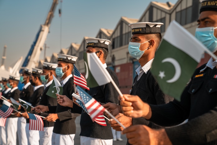 220125-N-N0146-1002 KARACHI, Pakistan (Jan. 25, 2022) Pakistan navy personnel welcome patrol coastal ships USS Squall (PC 7) and USS Whirlwind (PC 11) as they arrive in Karachi, Pakistan, for a scheduled port visit Jan. 25. Squall and Whirlwind are currently operating in the Middle East region to help ensure maritime security and stability.