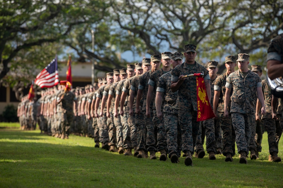 U.S. Marines with 2nd Battalion, 3rd Marines, 3rd Marine Division, march during the deactivation of 2nd Battalion, 3rd Marines on Marine Corps Base Hawaii, Hawaii, Jan. 21, 2022. The battalion is deactivating in accordance with Force Design 2030 as 3rd Marines modernizes to become the Corps’ inaugural Marine Littoral Regiment.