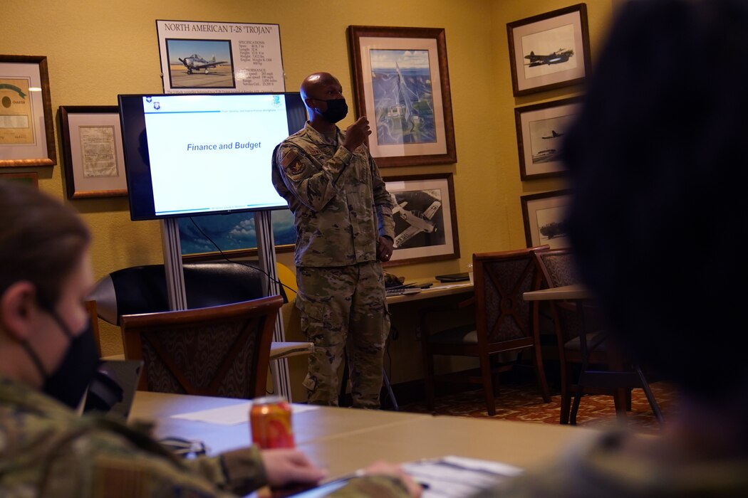 U.S. Air Force Capt. Demitrice Steward, 2nd Air Force section commander, briefs a class of officers before the First Term Officer Course inside the Bay Breeze Event Center at Keesler Air Force Base, Mississippi, January 19, 2022. The FTOC was created to develop the job and leadership skillsets of first-term officers. (U.S. Air Force photo by Senior Airman Seth Haddix)