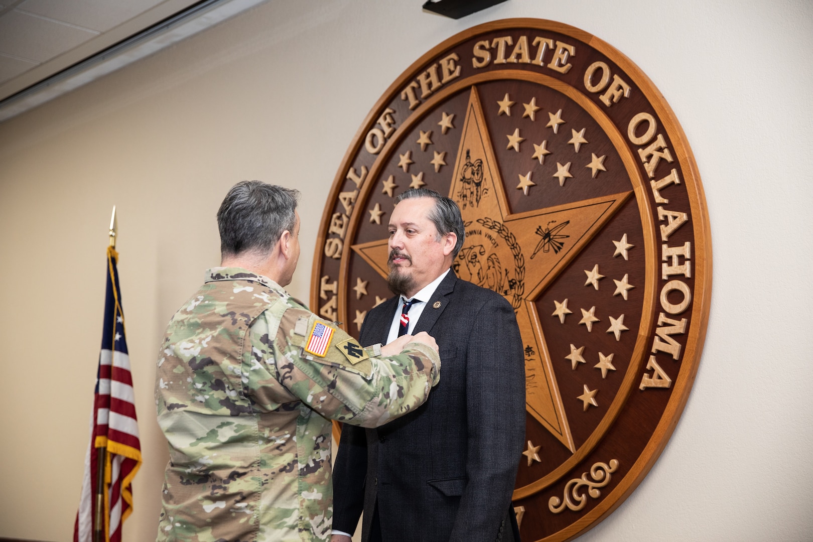 Oklahoma National Guard Brig. Gen. Thomas Mancino, the adjutant general for Oklahoma, presents Col. Thomas Mackey, former deputy United States Property and Fiscal officer, with the Legion of Merit award, at Joint Force Headquarters in Oklahoma City, Oklahoma, Jan. 22, 2022. Mackey’s career spanned 34 years and included three deployments. (Oklahoma National Guard photo by Spc. Danielle Rayon)