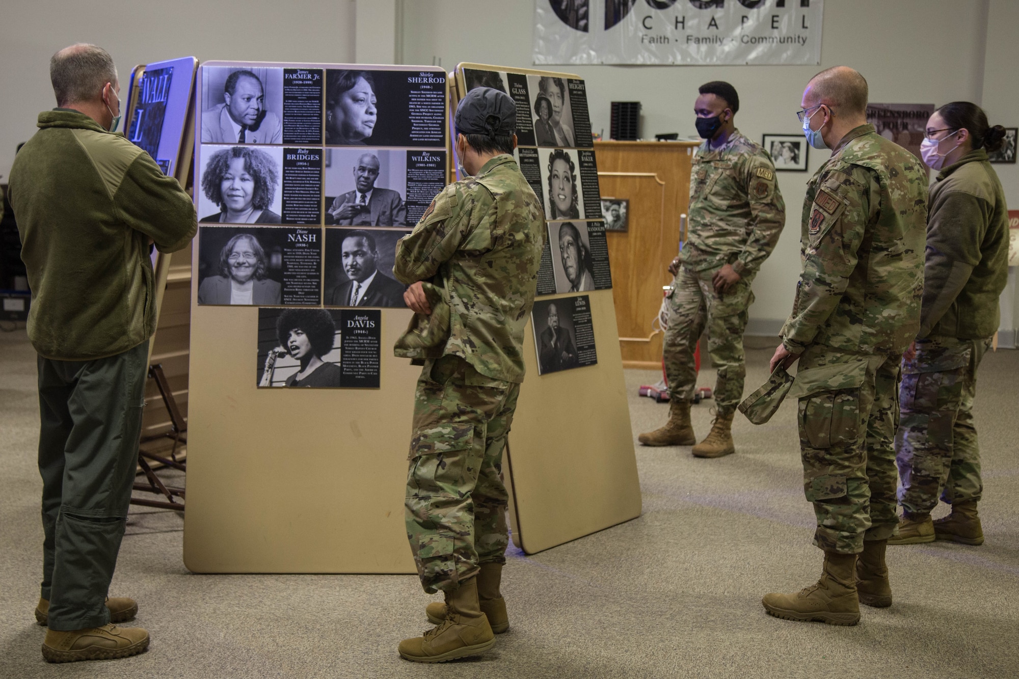 Airmen tour exhibits featuring Martin Luther King Jr. and other Civil Rights Leaders at a pop-up museum.