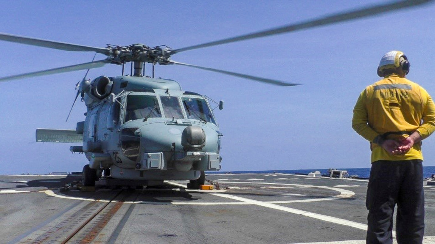 An MH-60R Seahawk Helicopter assigned to the "Scorpions" of Helicopter Maritime Strike Squadron (HSM) 49 prepares for take-off from the Arleigh Burke-class guided-missile destroyer USS Sampson (DDG 102) as the ship is positioned to conduct lifesaving actions in support of disaster relief efforts in Tonga. The Australian Government response is being coordinated closely with France and New Zealand under the FRANZ partnership; alongside Fiji, Japan, United Kingdom, and the United States, to assist Tonga in its time of need. Sampson is on a scheduled deployment in the U.S. 7th Fleet area of operations to enhance interoperability with alliances and partnerships while serving as a ready-response force in support of a free and open Indo-Pacific region.