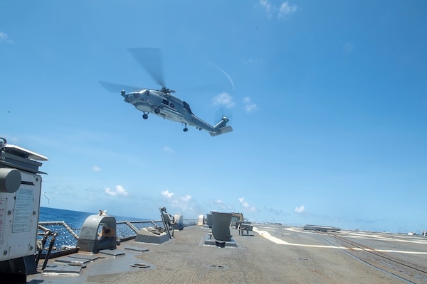 An MH-60R Seahawk Helicopter assigned to the "Scorpions" of Helicopter Maritime Strike Squadron (HSM) 49 prepares for take-off from the Arleigh Burke-class guided-missile destroyer USS Sampson (DDG 102) as the ship is positioned to conduct lifesaving actions in support of disaster relief efforts in Tonga. The ship is operating in support of the Australian Defence Force (ADF). The Australian Government response is being coordinated closely with France and New Zealand under the FRANZ partnership; alongside Fiji, Japan, United Kingdom, and the United States, to assist Tonga in its time of need. Sampson is on a scheduled deployment in the U.S. 7th Fleet area of operations to enhance interoperability with alliances and partnerships while serving as a ready-response force in support of a free and open Indo-Pacific region.