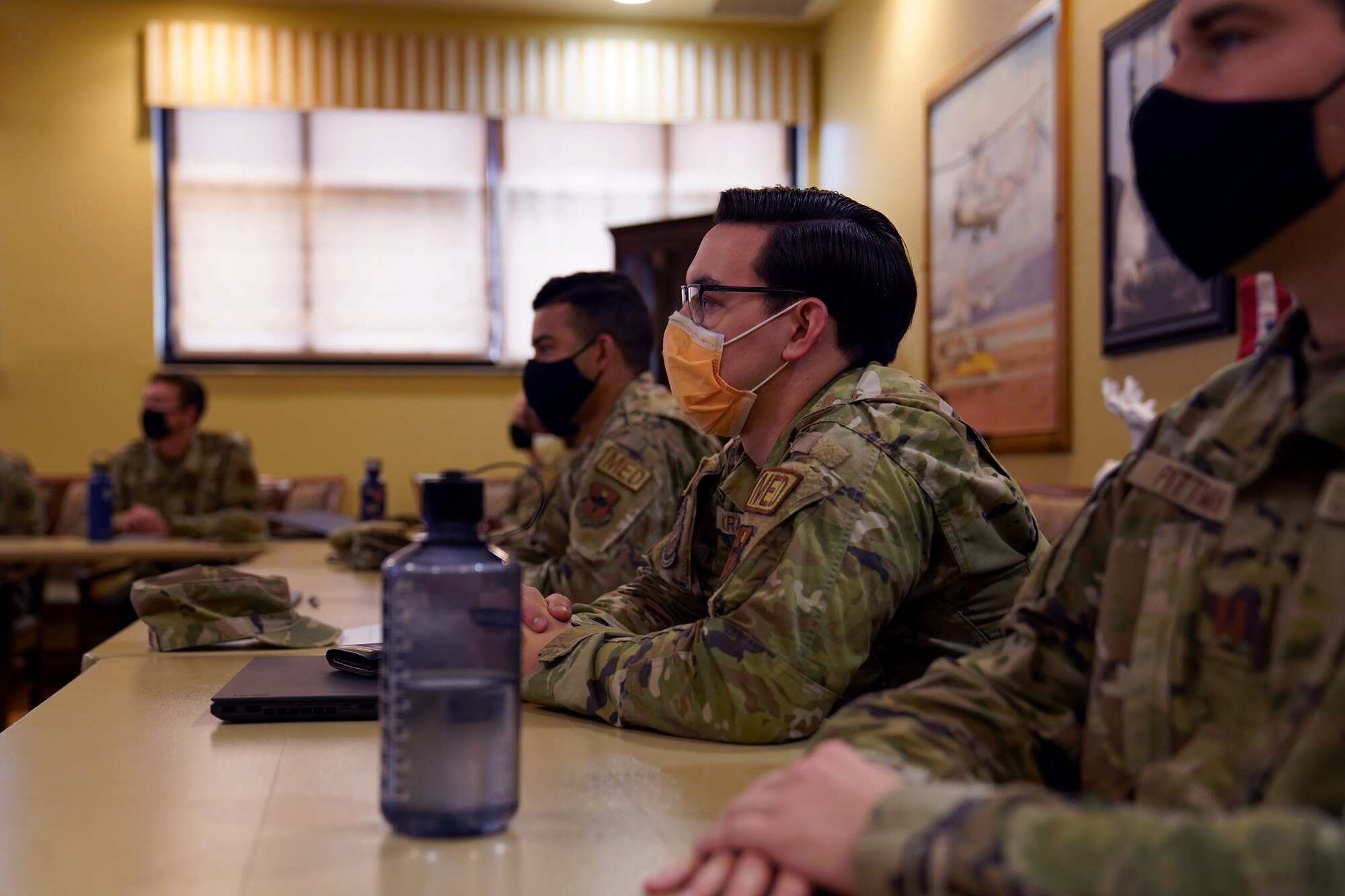 U.S. Air Force officers listen to briefings during the First Term Officer Course in the Bay Breeze Event Center at Keesler Air Force Base, Mississippi, January 19, 2022. The FTOC was created to develop the job and leadership skillsets of first-term officers. (U.S. Air Force photo by Senior Airman Seth Haddix)