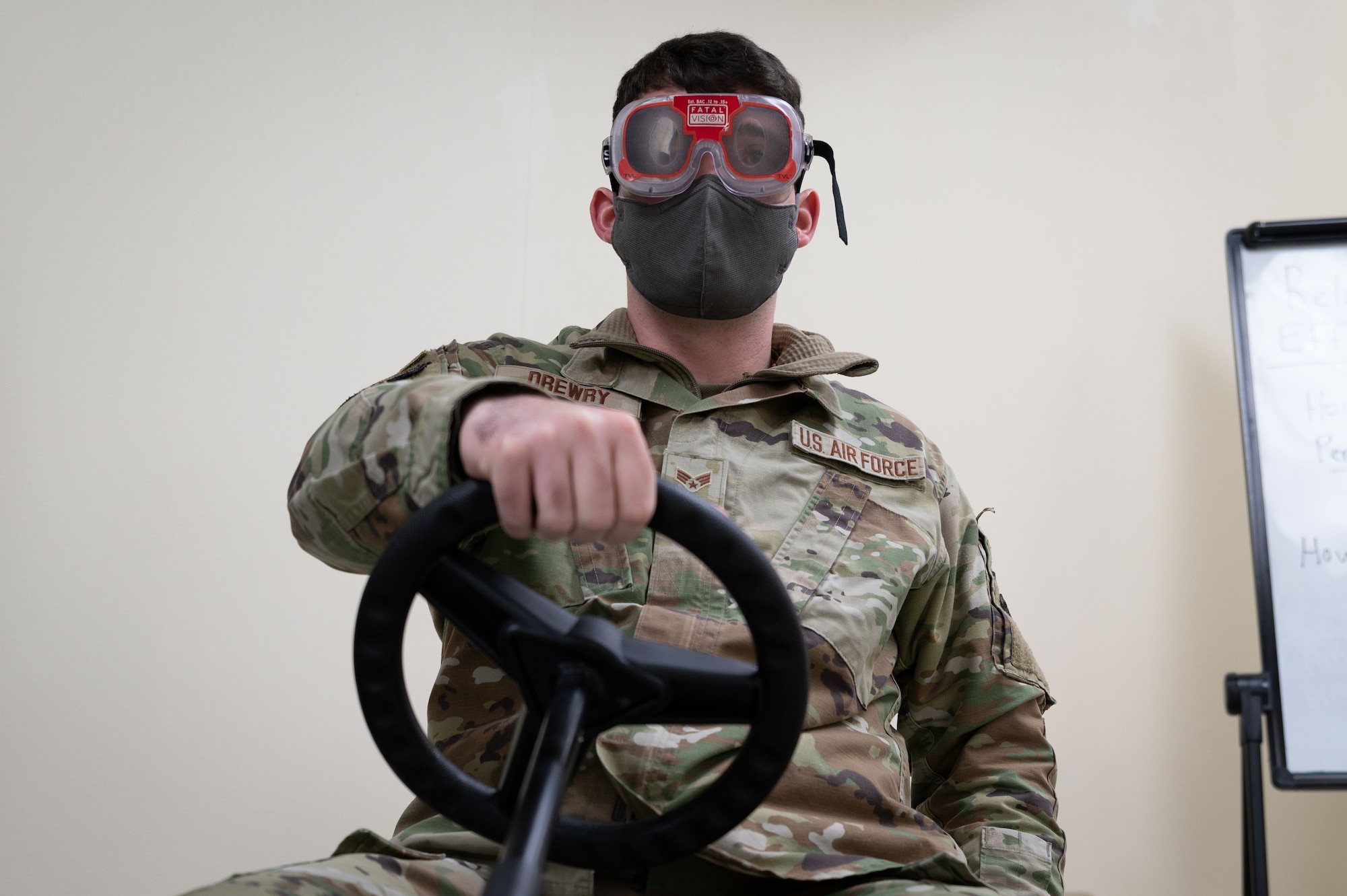 U.S. Air Force Senior Airman Brennan Drewry, 51st Operational Medical Readiness Squadron Alcohol and Drug Abuse Prevention and Treatment technician, drives a drunk cart at Osan Air Base, Republic of Korea, Jan. 25, 2022.