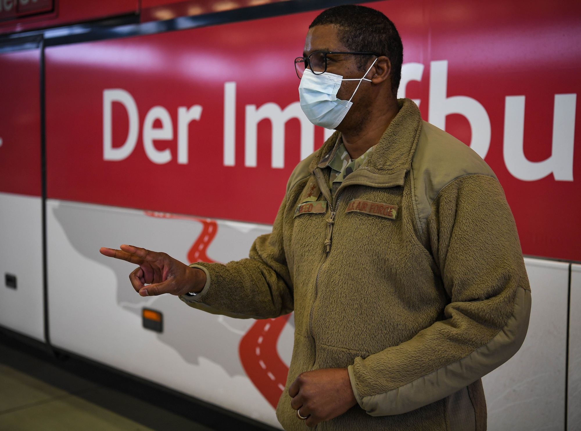 U.S. Air Force Maj. Gen. Randall Reed, 3rd Air Force commander, visits the site of the COVID-19 vaccine and booster shot immunizations at Ramstein Air Base, Germany, Jan. 25, 2022. RAB partnered with German health officials to bring the local vaccine bus to the installation and provide COVID-19 vaccines to the local national workforce and U.S. and NATO personnel. Reed commended the Airmen who set up Hangar three for the German Red Cross and is proud of the long-standing unity between Ramstein and its local partners. (U.S. Air Force photo by Airman 1st Class Jared Lovett)