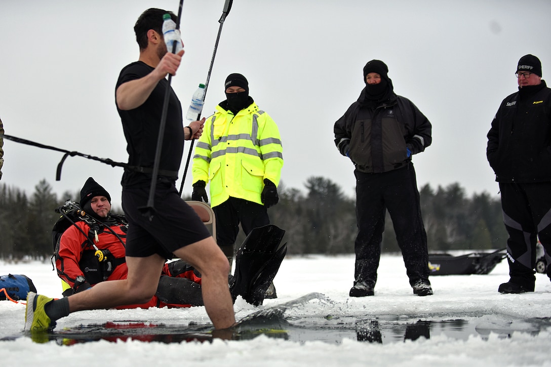 Northern Strike “Ice bath:” military, local emergency responders team up for hypothermia training