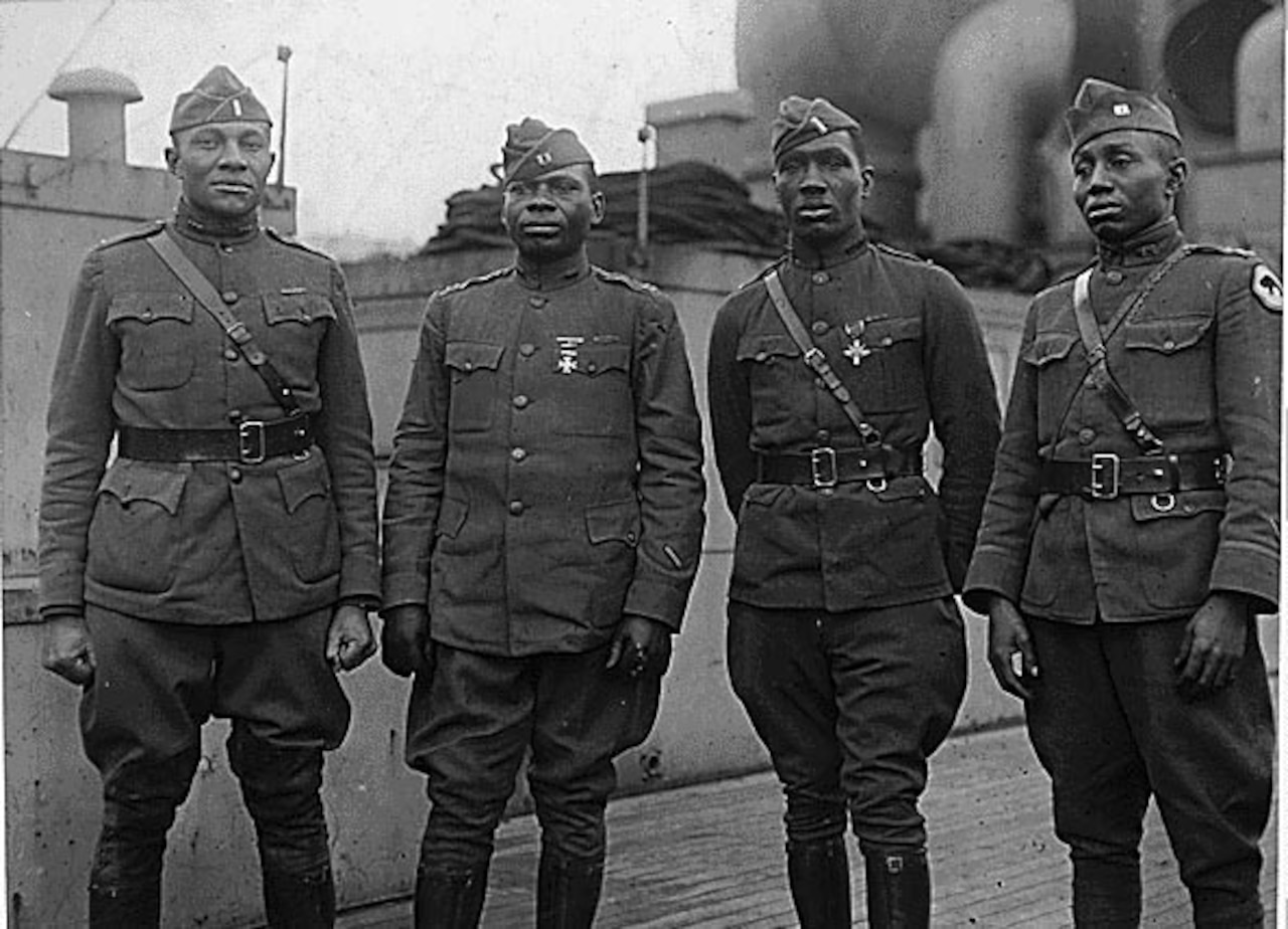 Soldiers pose for a group photo.