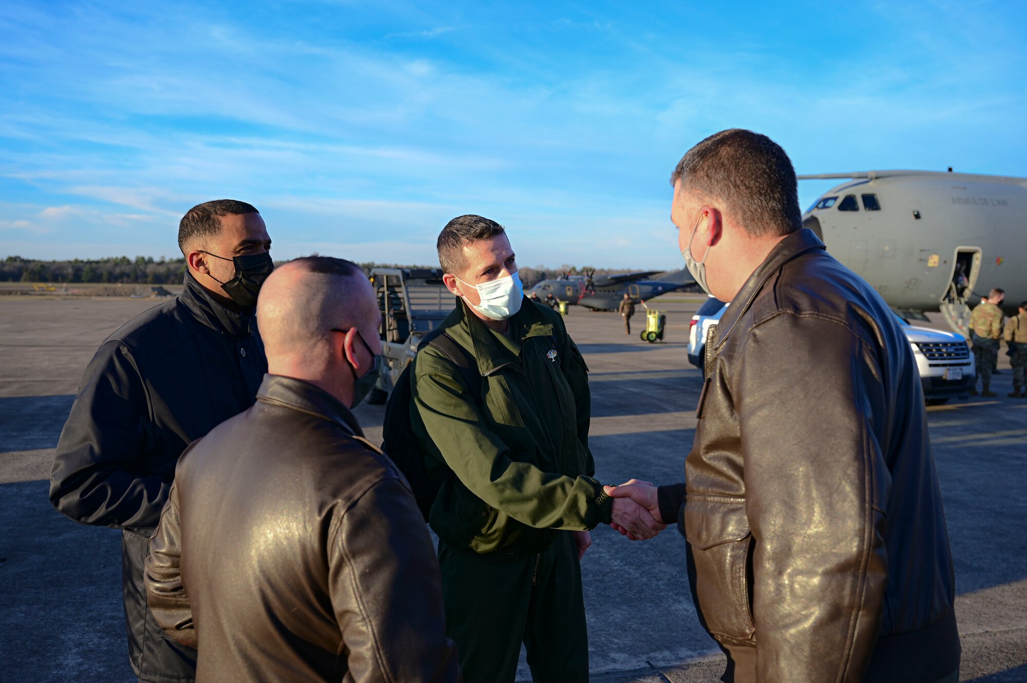 Lt. Col. Franck Dumora, French Air and Space Force detachment commander, is greeted by U.S. Air Force Lt. Col. Phillip Newman, 34th Combat Training Squadron commander, upon arriving to Little Rock Air Force Base