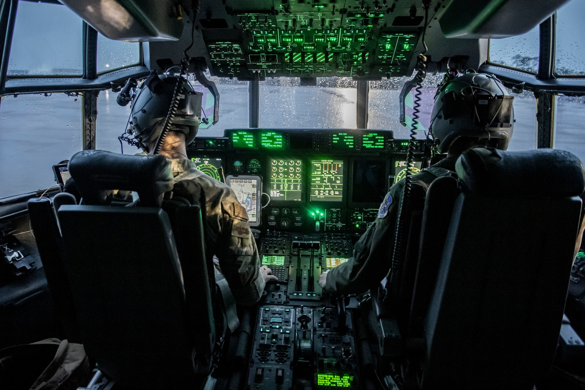 Photo of pilots flying an aircraft