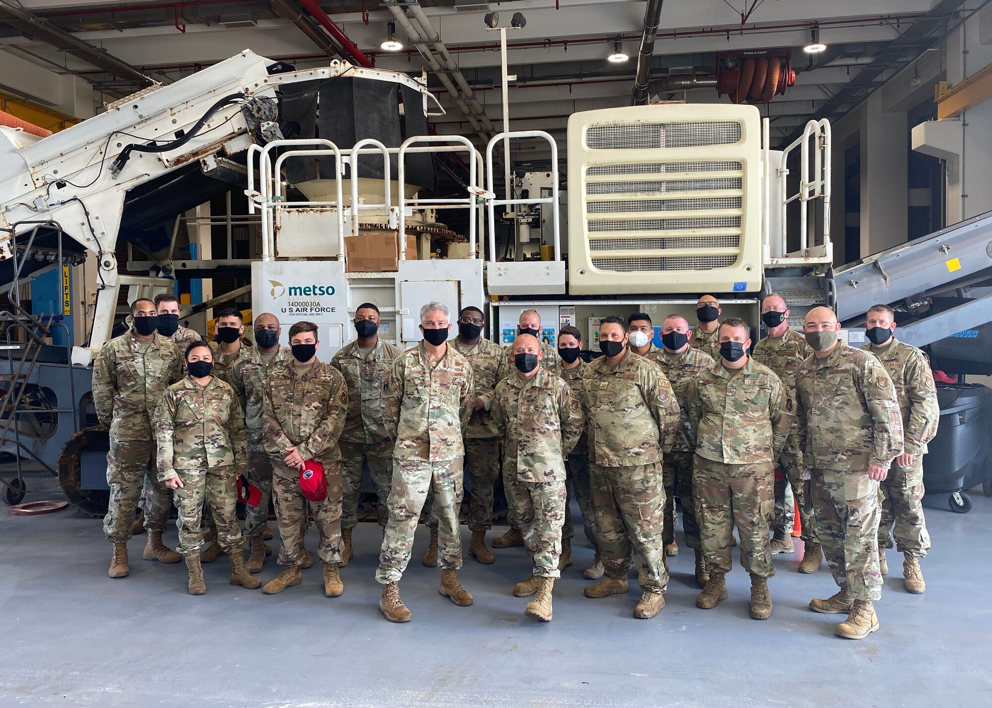 U.S. Air Force members with the 36th Contingency Response Group take a group photo with Brig. Gen. Jeremy Sloane, commander of the 36th Wing, and Chief Master Sgt. John Payne, command chief of the 36th Wing, after a member received Linebacker of the Week award at the 36th Wing, Andersen Air Force Base, Guam, Jan. 19, 2022. The Team Andersen Linebacker of the Week recognizes outstanding enlisted, officer, civilian and total force personnel who have had an impact on achieving Team Andersen’s Mission, Vision and Priorities. (U.S. Air Force photo by Senior Airman Aubree Owens)