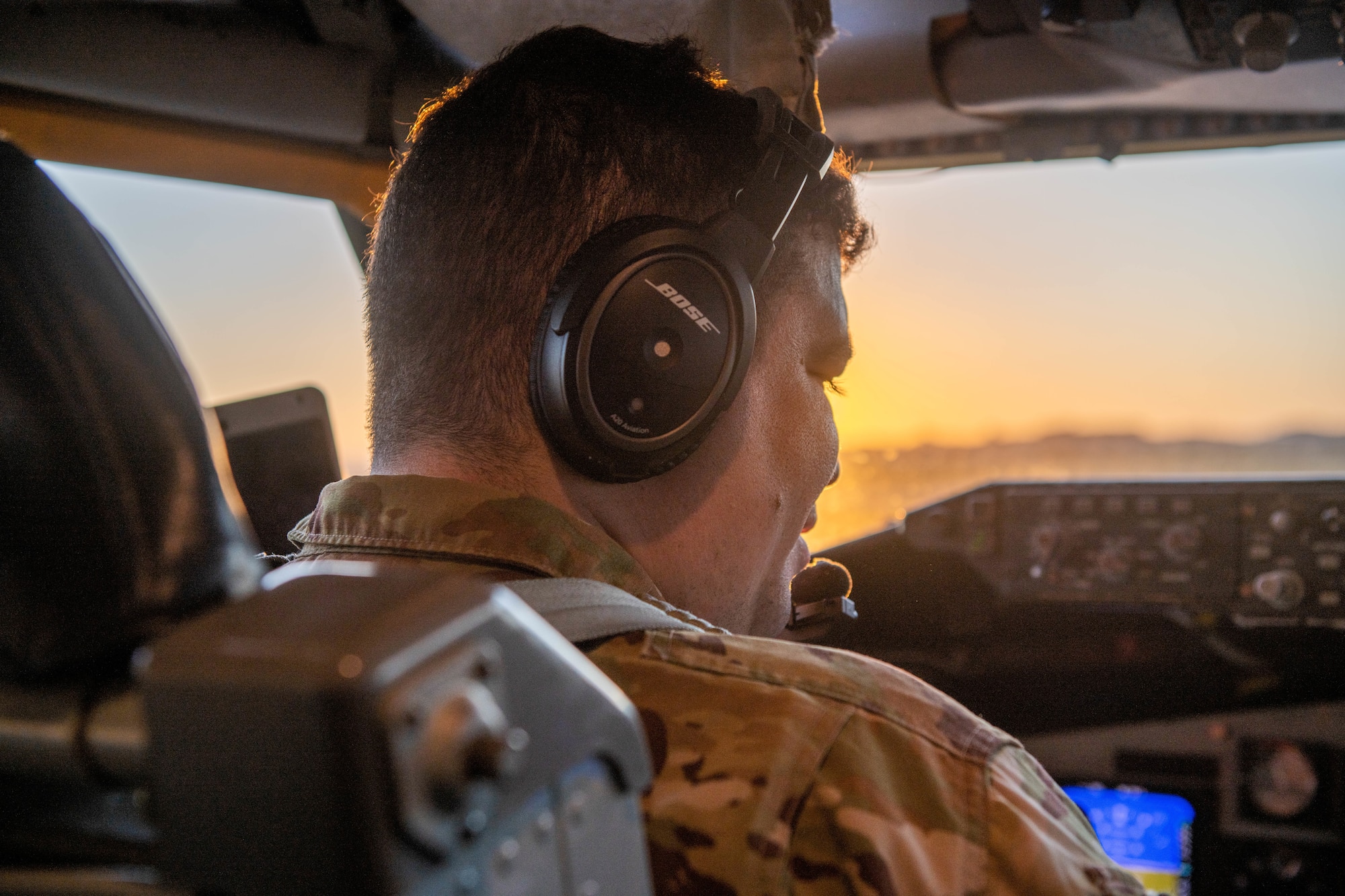 The sun rises as a pilot taxis onto a runway