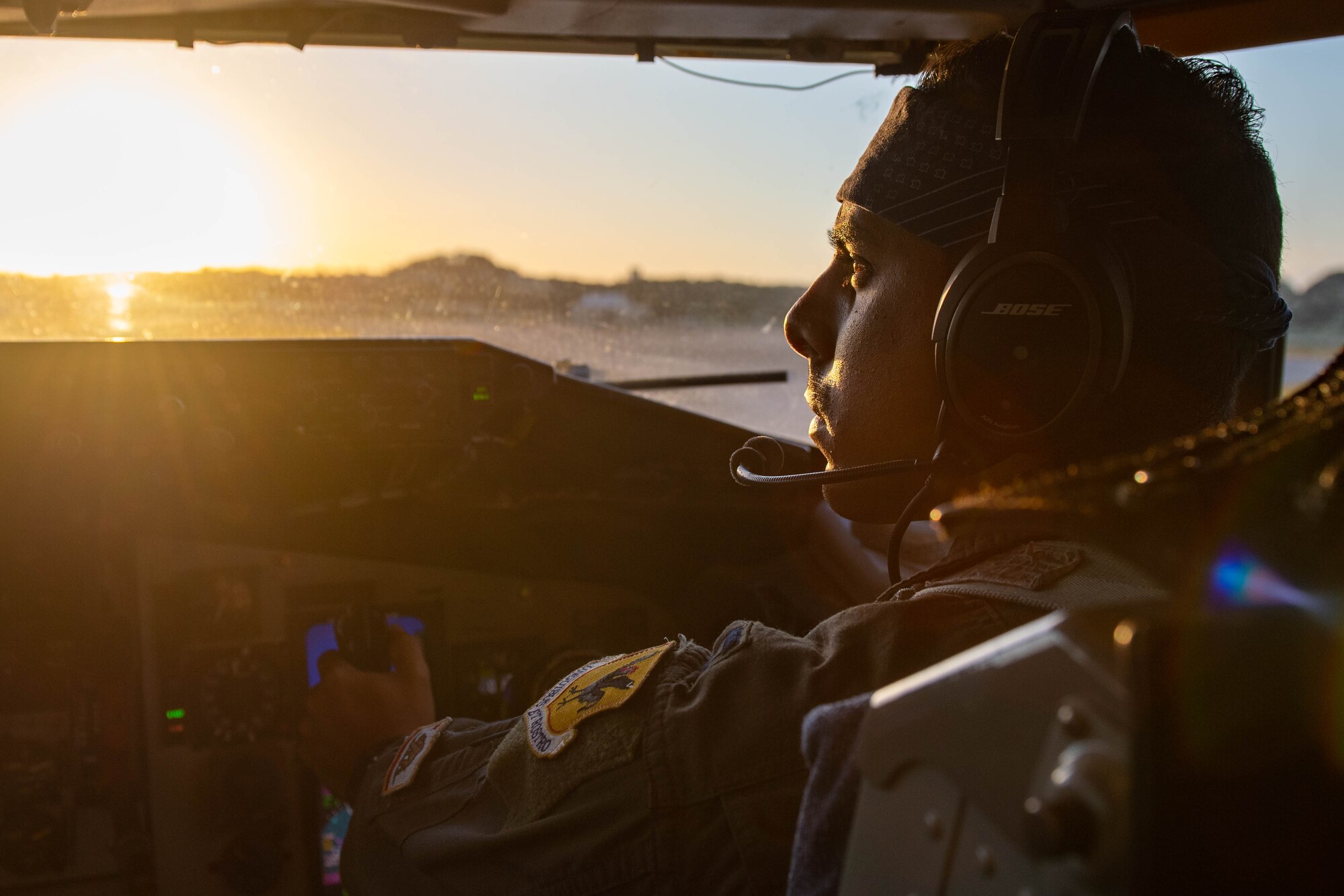 The sun rises as a pilot taxis onto a runway