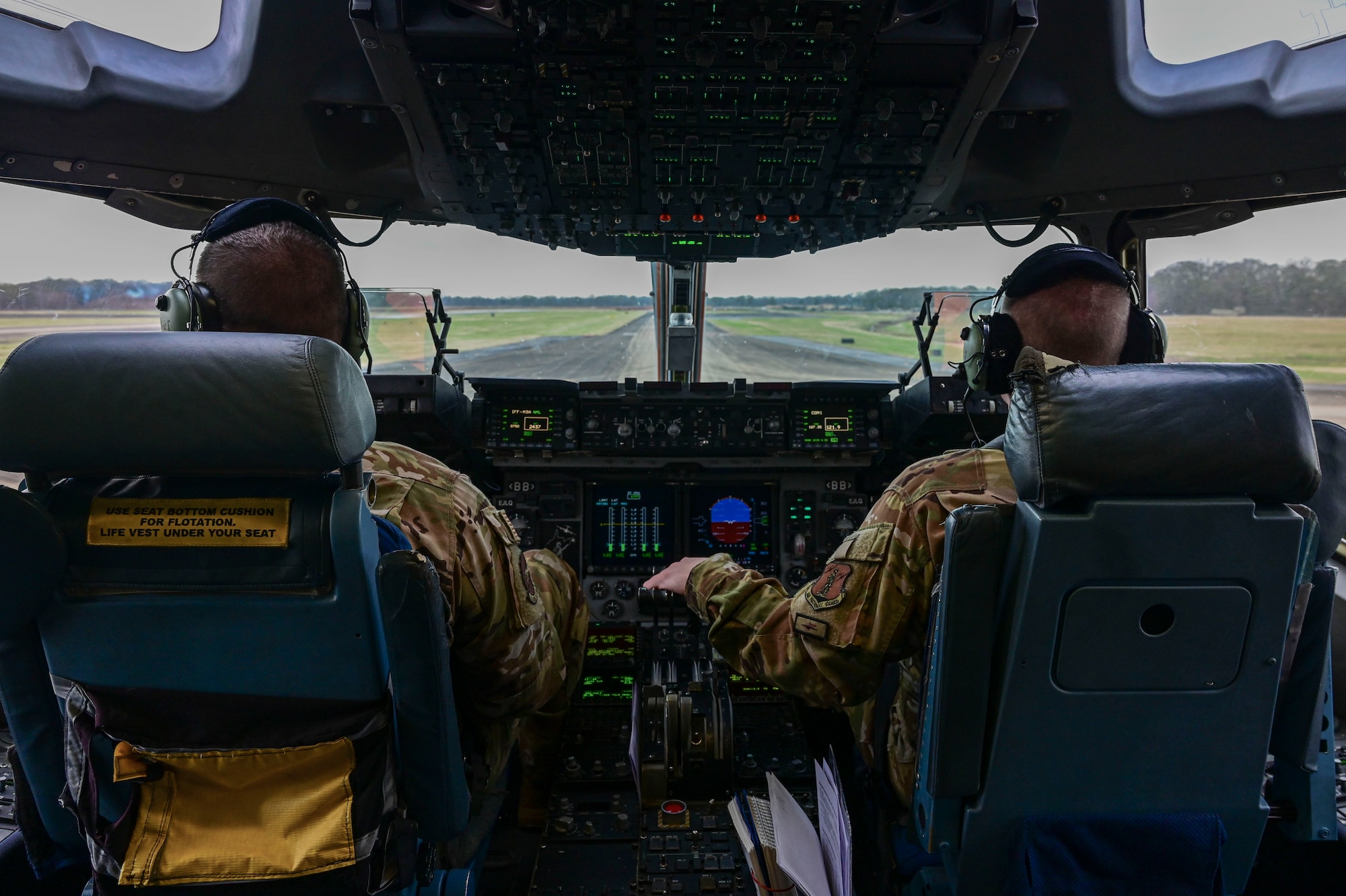 Pilots land a C-17 Globemaster III