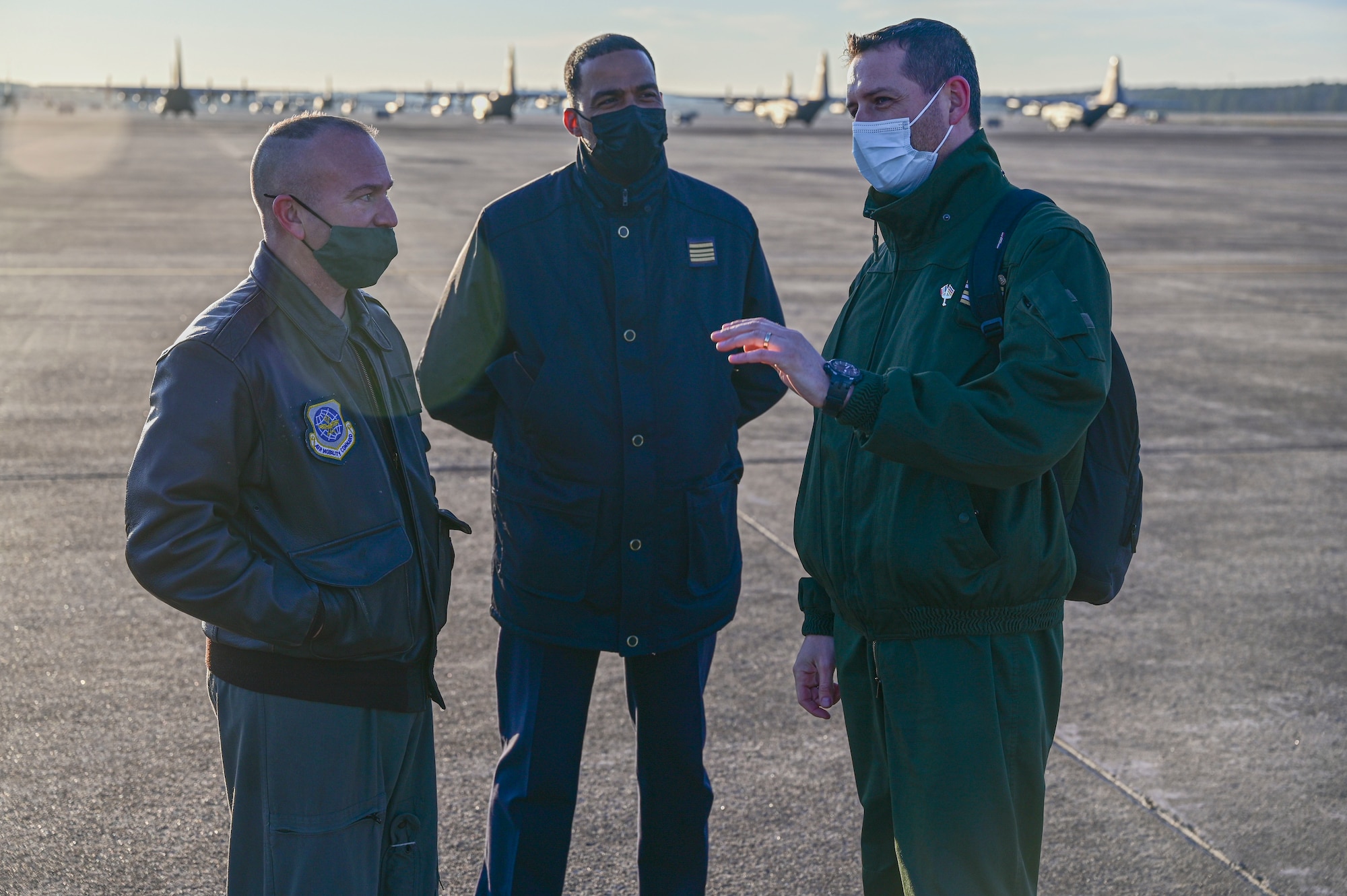 U.S. Air Force Maj. Phillip Erwin, 34th CTS GFLR exercise director, left, speaks with Lt. Col. Franck Dumora, French Air and Space Force detachment commander, right