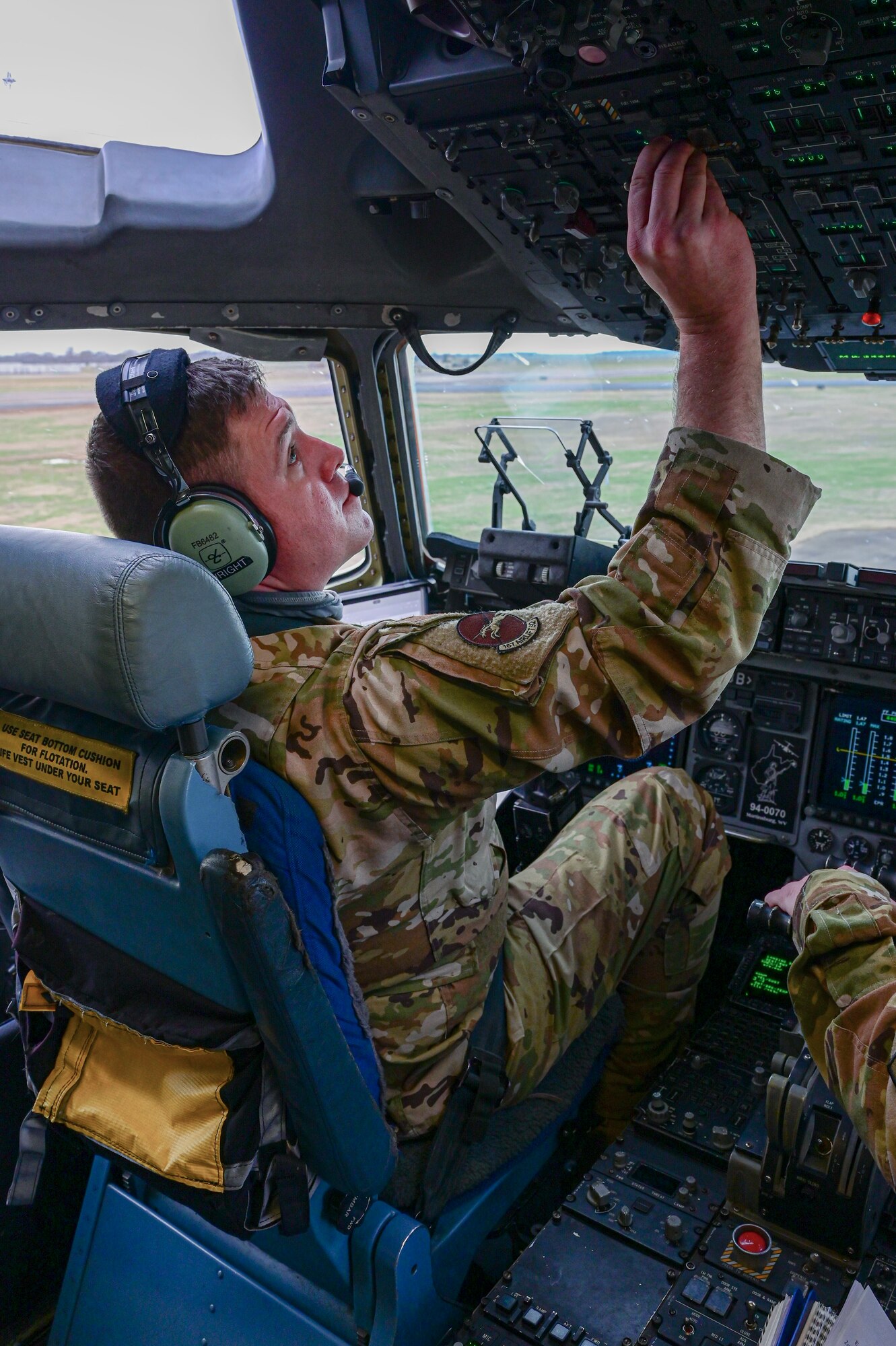 A pilot lands a C-17 Globemaster III
