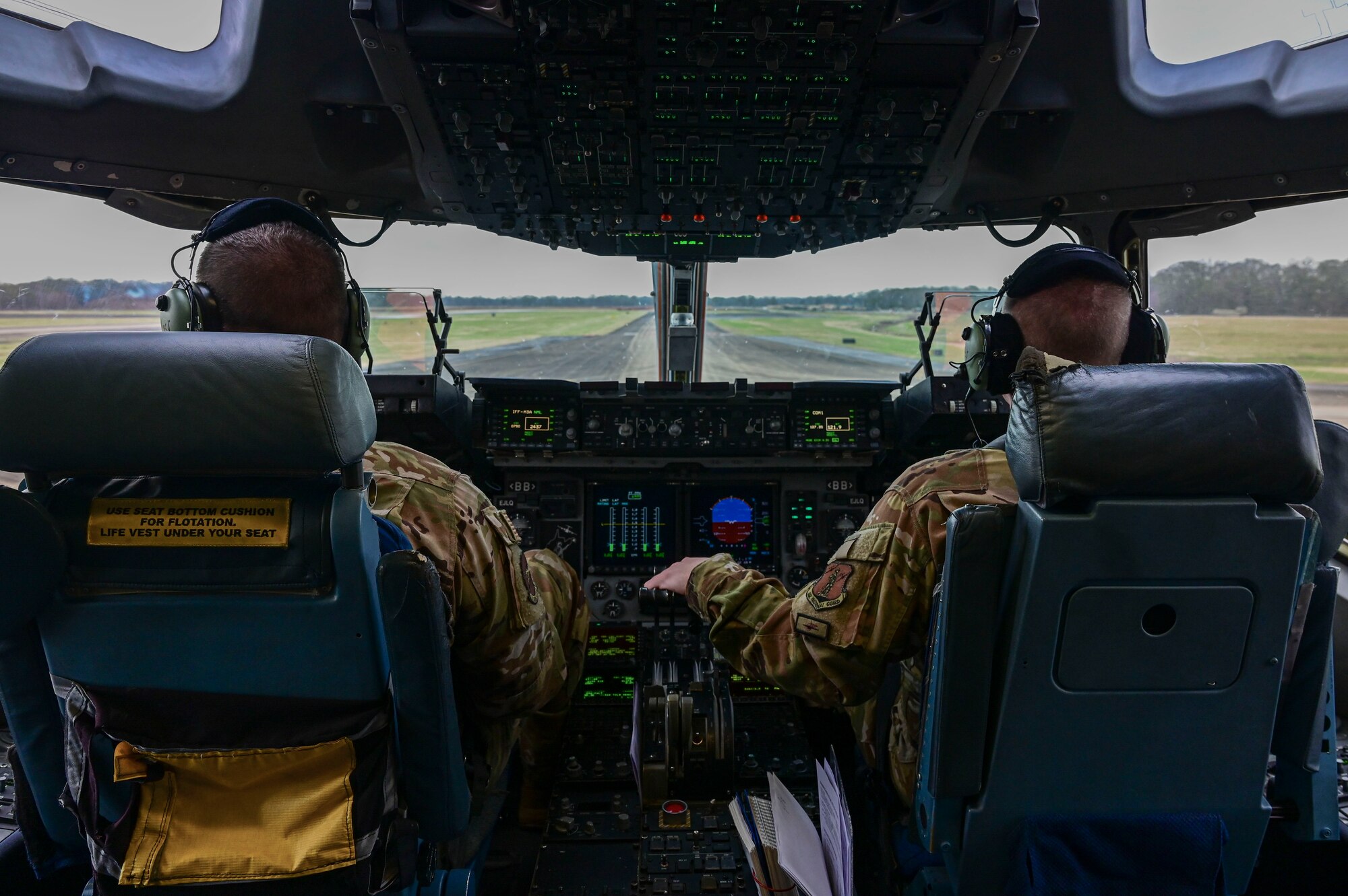 Pilots land a C-17 Globemaster III