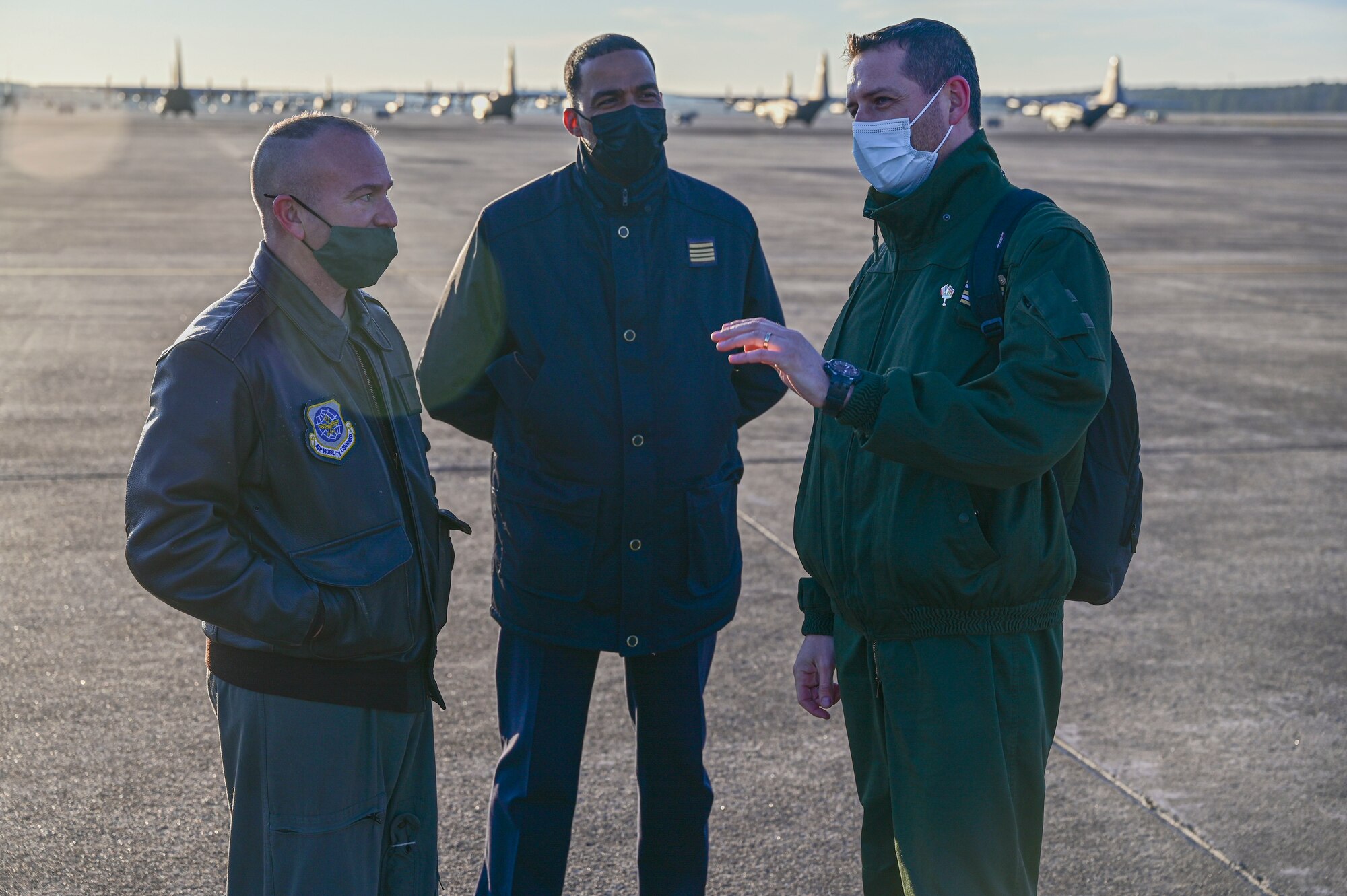 U.S. Air Force Maj. Phillip Erwin, 34th CTS GFLR exercise director, left, speaks with Lt. Col. Franck Dumora, French Air and Space Force detachment commander, right