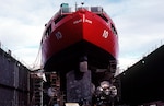 Coast Guard Cutter Polar Star, a polar icebreaker, in drydock. Since the late 1970s, these 400-foot mammoths of the Coast Guard fleet, based in Seattle, Wash., have been traveling north and south for their primary mission of scientific and logistical support in both Polar Regions. Polar class icebreakers have a variety of missions while operating in polar regions. During Antarctic deployments, their primary missions include breaking a channel through the sea ice to resupply the McMurdo Research Station in the Ross Sea. Resupply ships using the channel to bring food, fuel, and other goods to make it through another winter. In addition, to these duties, Polar Star also serves as a scientific research platform with five laboratories and accommodations for up to 20 scientists. The "J"-shaped cranes and work areas near the stern and port side of ship give scientists the capability to do at-sea studies in the fields of geology, vulcanology, oceanography, sea-ice physics and other disciplines. U.S. COAST GUARD PHOTO