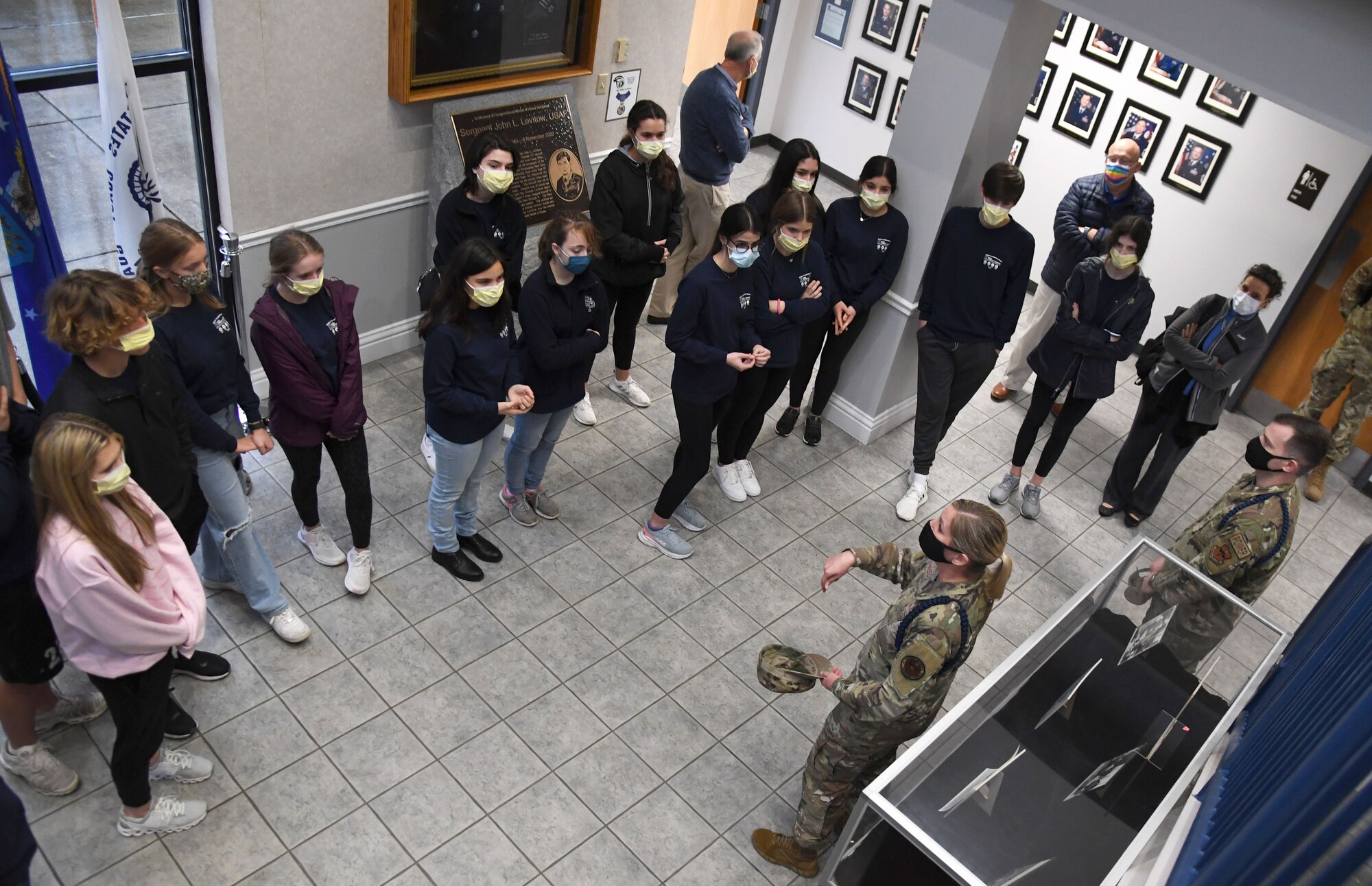 U.S. Air Force Master Sgt. Jessica Johnson, 81st Training Support Squadron military training superintendent, welcomes high school students to the Levitow Training Support Facility during a tour at Keesler Air Force Base, Mississippi, Jan. 25, 2022. Approximately 20 Freshmen from Biloxi High School and St. Patrick Catholic High School participated in the Biloxi Chamber of Commerce Junior Leadership Program whose purpose is to produce students of outstanding character who are more sensitive to the needs of the community and are better able to contribute to society. (U.S. Air Force photo by Kemberly Groue)