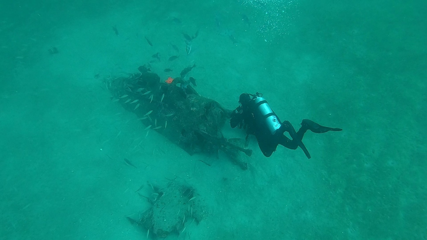 Dr. George Schwarz, NHHC Underwater Archaeologist, documents the F8F Bearcat wreck site off NAS Pensacola