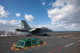 An F/A-18F Super Hornet launches from USS Harry S. Truman (CVN 75) in support of Neptune Strike 2022.