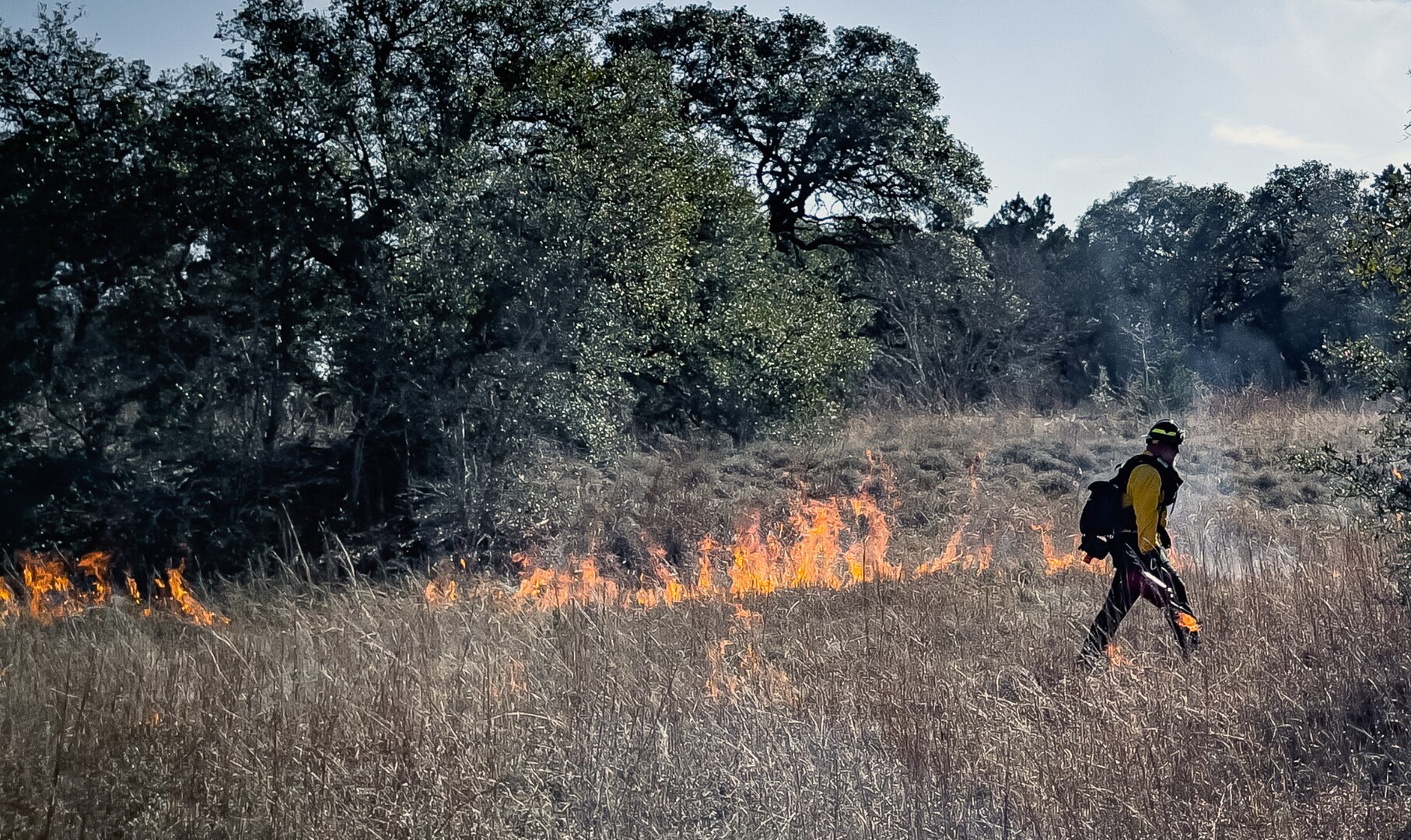 Joint Base San Antonio’s Natural Resources Office, Fire & Emergency Services, and Air Force Wildland Fire Branch officials conducted a prescribed burn Jan. 19