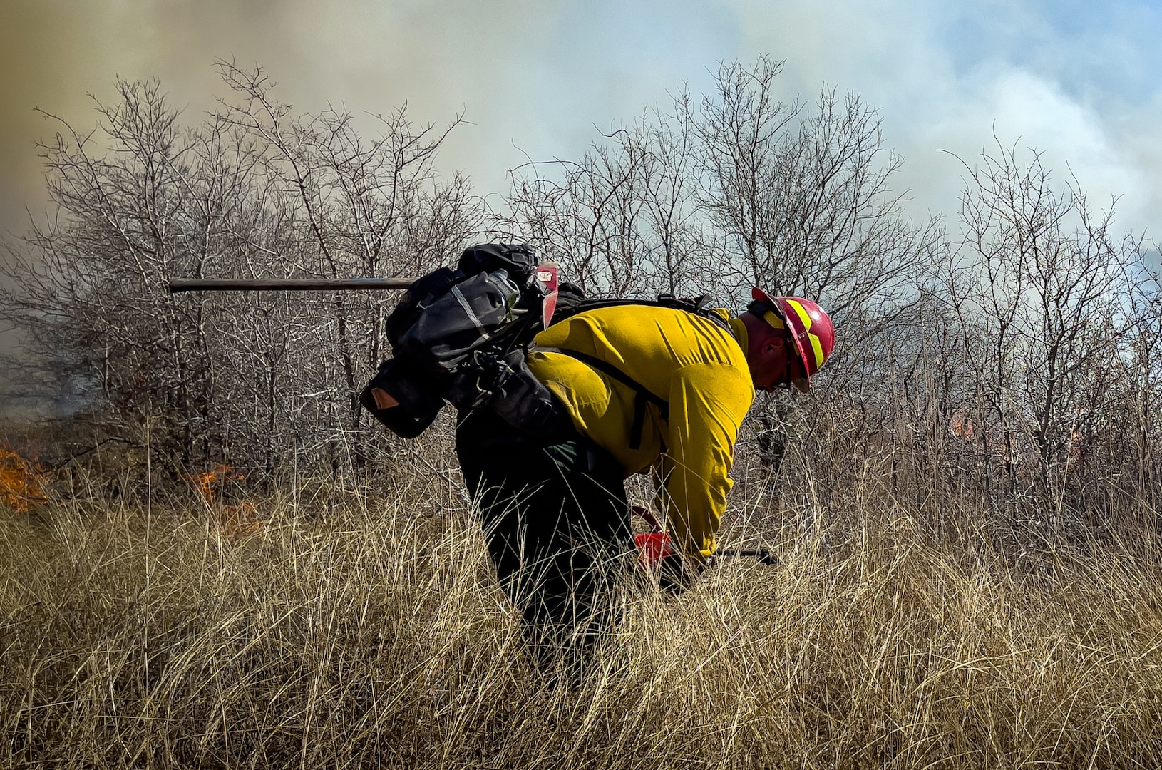 Joint Base San Antonio’s Natural Resources Office, Fire & Emergency Services, and Air Force Wildland Fire Branch officials conduct a prescribed burn