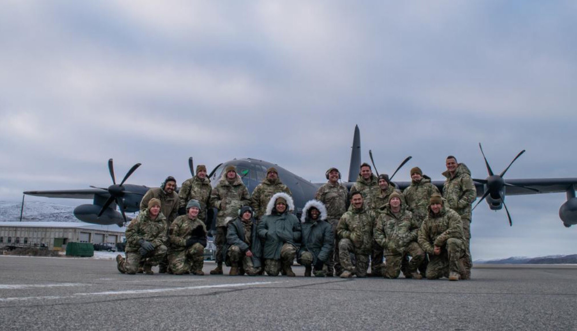 New York Air National Guard members assigned to the 106th Rescue Wing pose for a photograph in Kangerlussuaq, Greenland following a week-long training mission with the Danish military on Nov. 9, 2021. The Airmen deployed to Greenland along with members of the New York Air National Guard's 109th Airlift Wing to be part of a search and rescue training exercise.