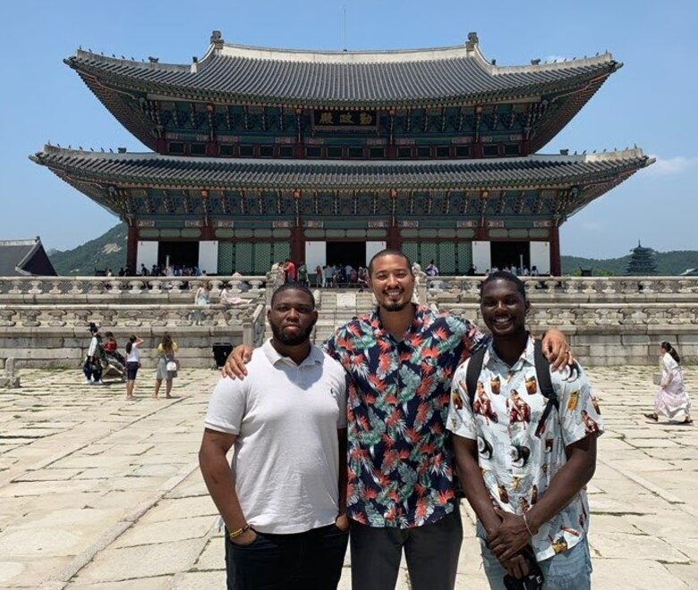 Far East District interns, Samuel Coleman (left) and Oluwaferanmi Ogundana (right), pose for a photo with Kenith Ward (middle), Security Operations Resident Office resident engineer at Gyeongbokgung Palace, Seoul, South Korea, June 2019. FED recruitment efforts for the 2022 summer internships are starting in February. (Courtesy photo)