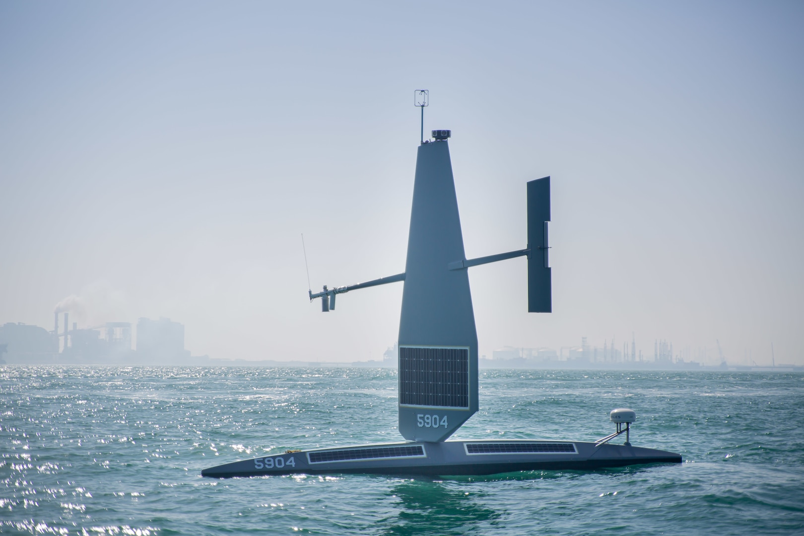 220127-A-RM286-2136 ARABIAN GULF (Jan. 27, 2022) A Saildrone Explorer unmanned surface vessel (USV) sails in the Arabian Gulf off Bahrain’s coast, Jan. 27. U.S. Naval Forces Central Command began operationally testing the USV as part of an initiative to integrate new unmanned systems and artificial intelligence into U.S. 5th Fleet operations.